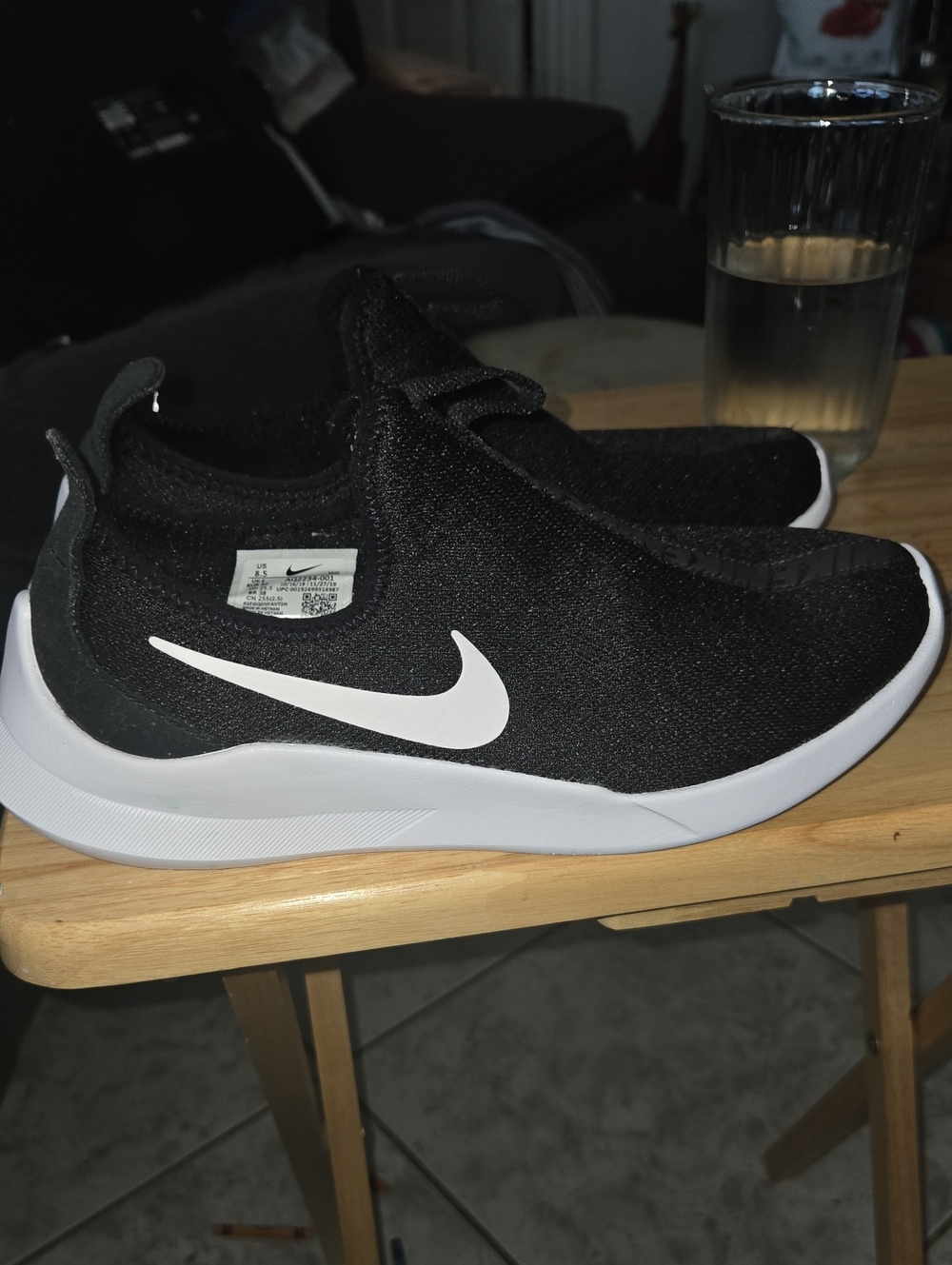 Nike Womens Black Slip-On Sneakers with White Swoosh